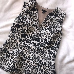 ANN TAYLOR PEPLUM ANIMAL ANIMAL PRINT TOP.